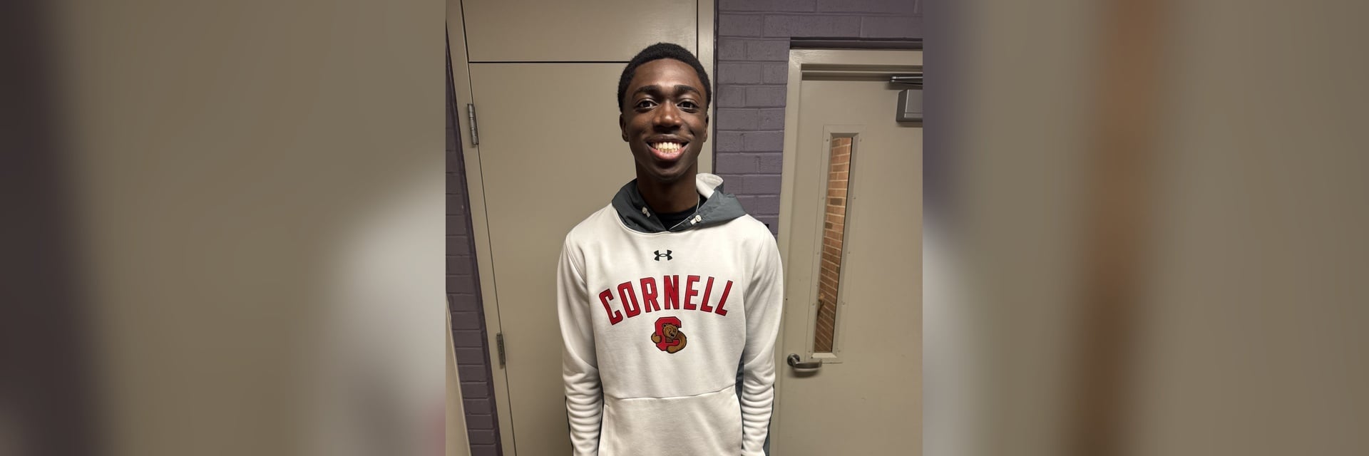 Kevin Nti happily receives his MCU Foundation Scholarship